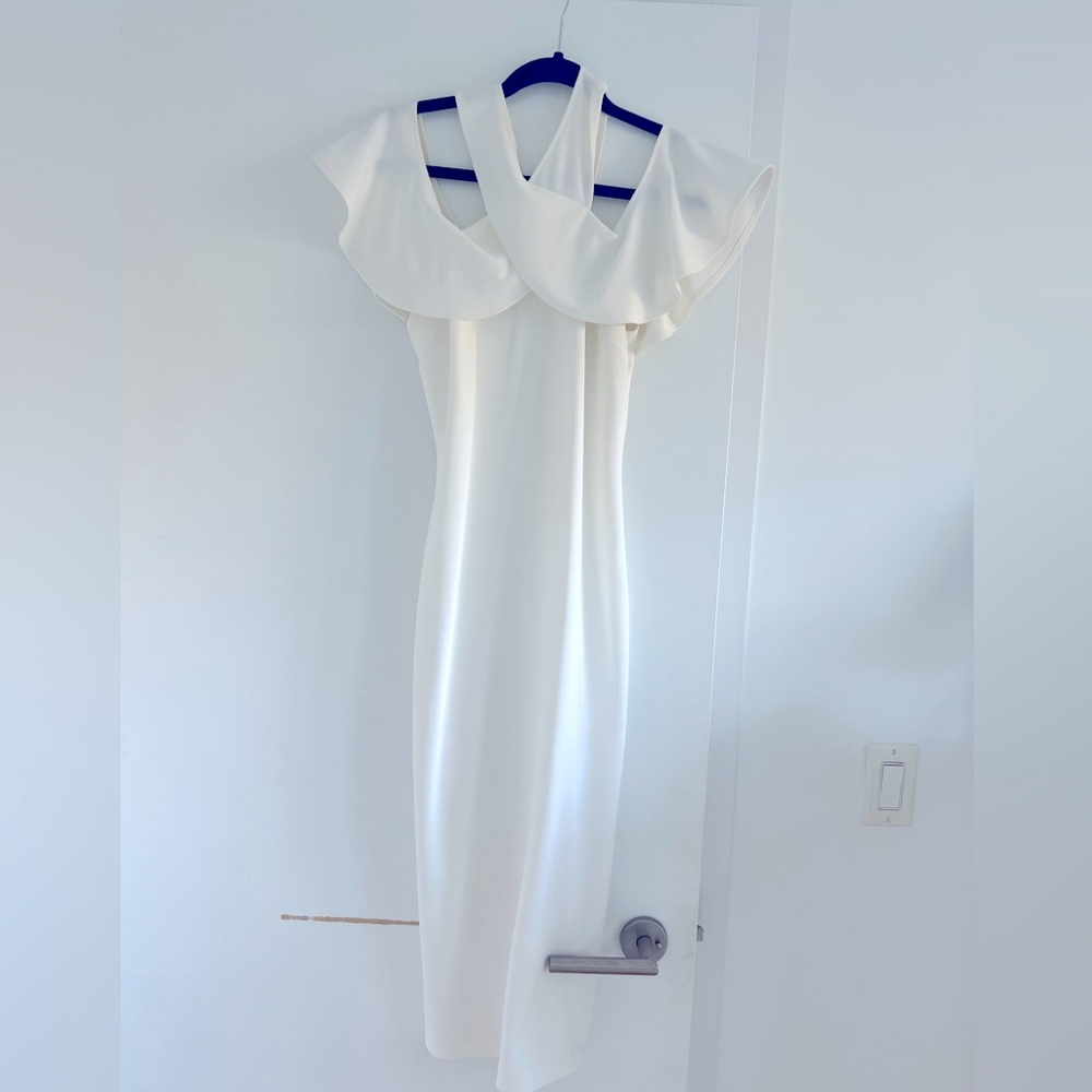 Small, white Rachel Roy dress.